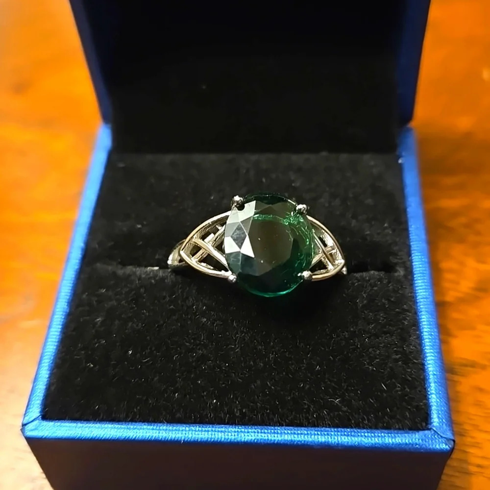 Celtic-Inspired Emerald Green Solitaire Ring